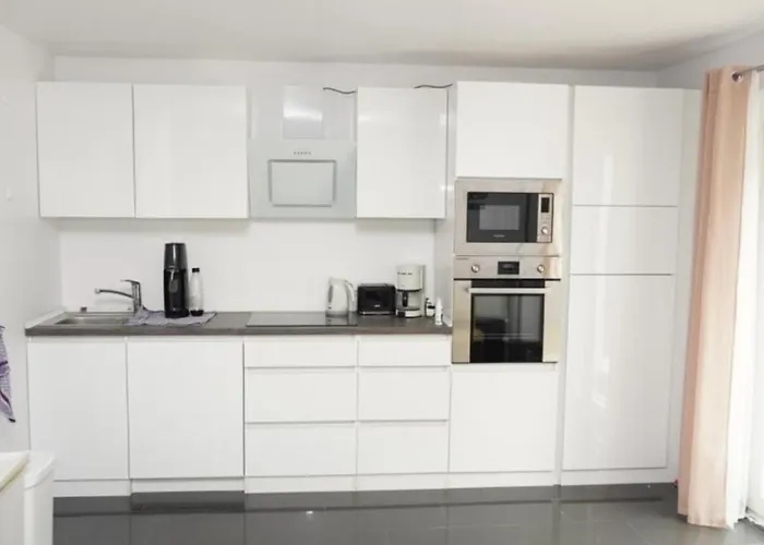 Ferienvermietung: Blumenberg Ferienwohnung